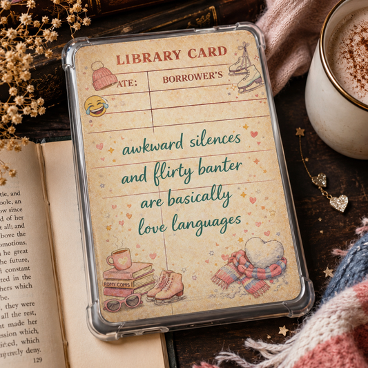 Cozy Romance Library Card Kindle insert with warm bookish illustrations, hearts, books, mugs, scarves, and a flirty quote