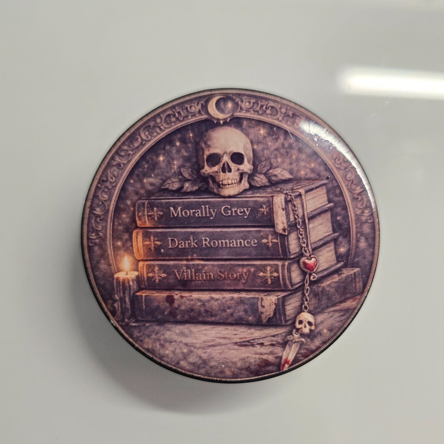 Morally grey gothic MagSafe Kindle grip with vintage dark book aesthetic
