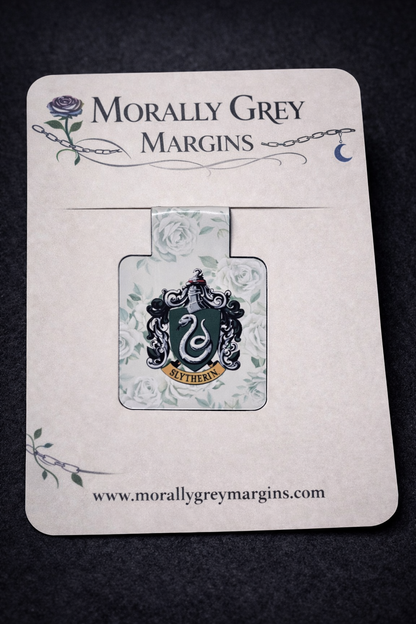 Bookish magnetic bookmark featuring a green serpent crest with floral background, handmade dark academia page marker by Morally Grey Margins