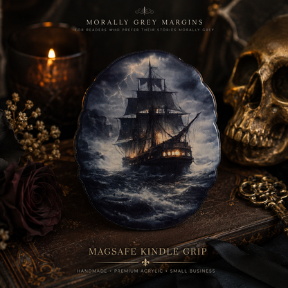 Close-up of a dark nautical magnetic device grip with a storm-tossed ship and rough ocean artwork